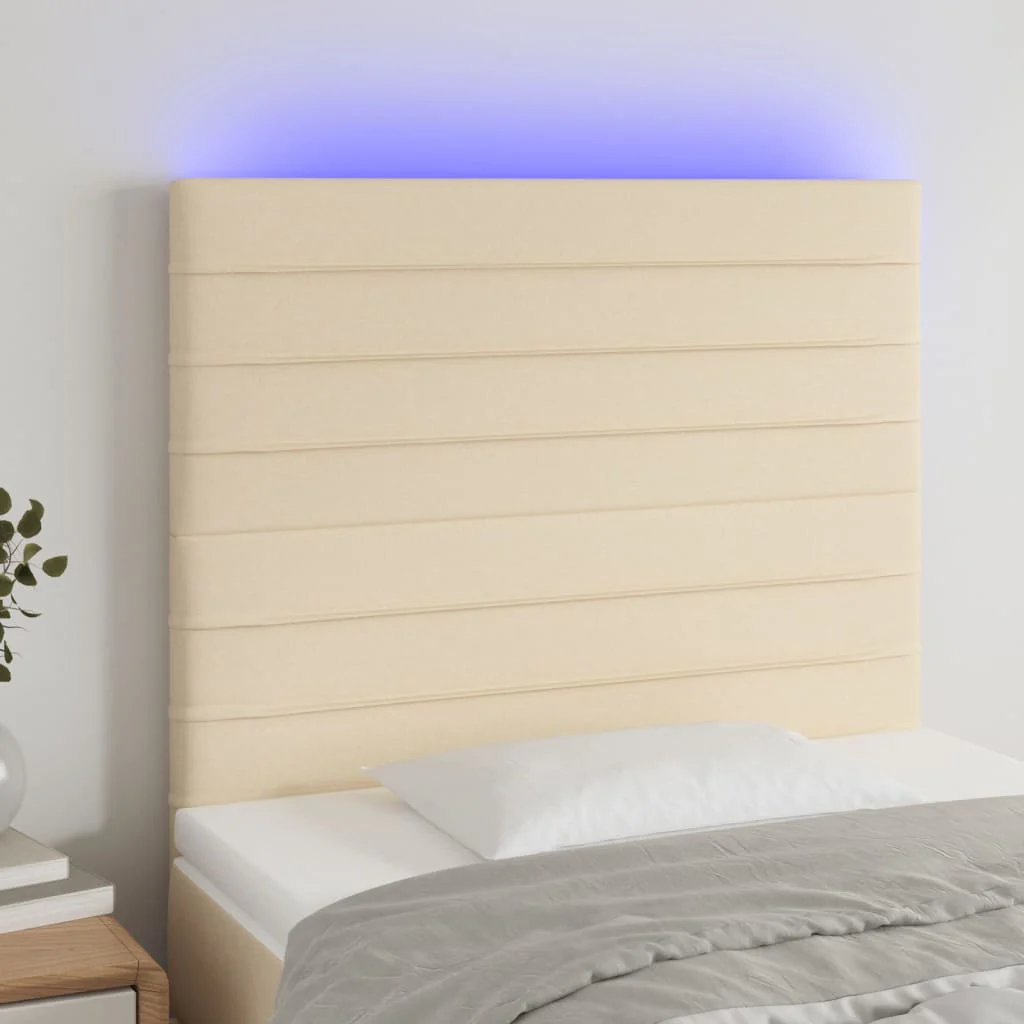 sengegavl med LED-lys 100x5x118/128 cm stof cremefarvet