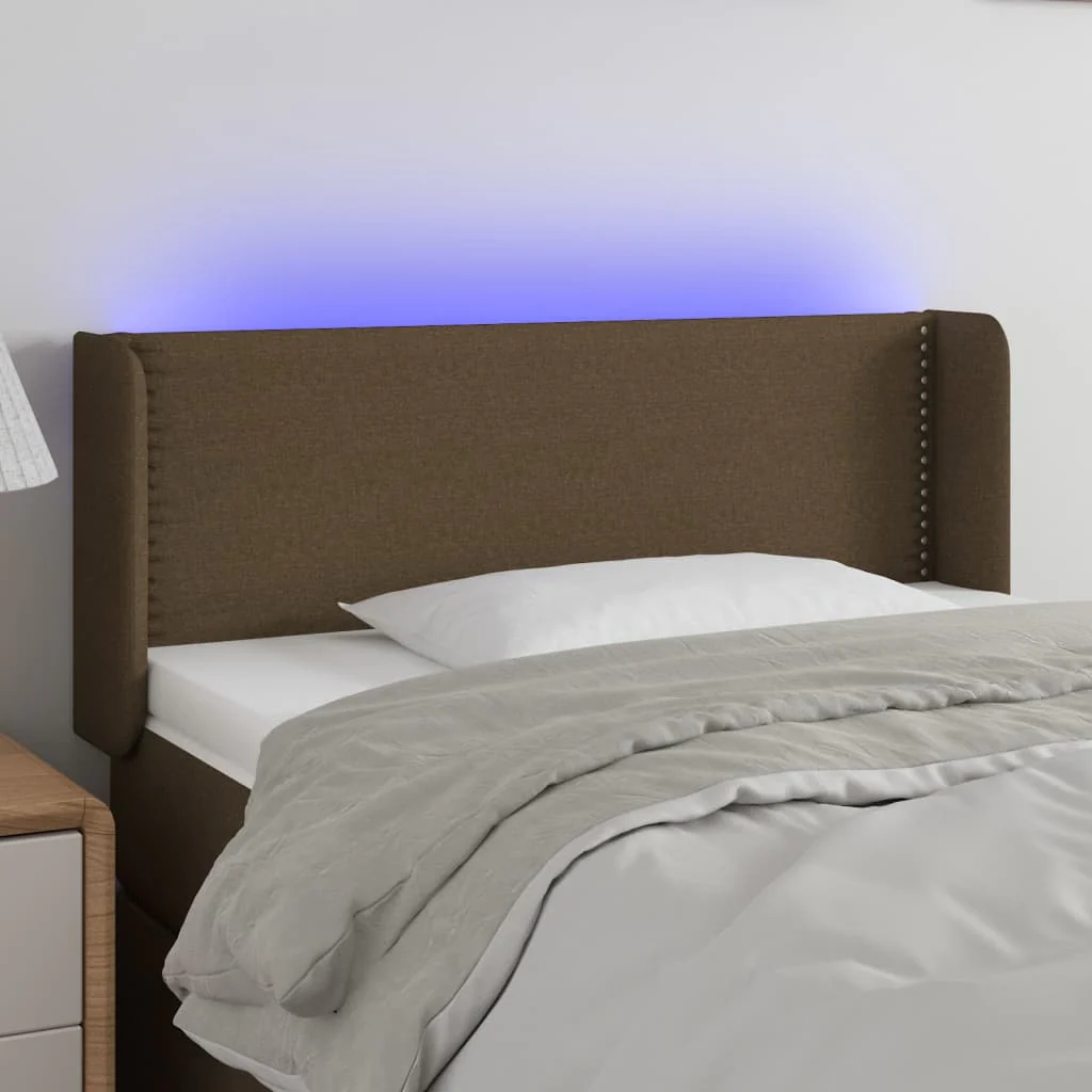 sengegavl med LED-lys 103x16x78/88 cm stof mørkebrun