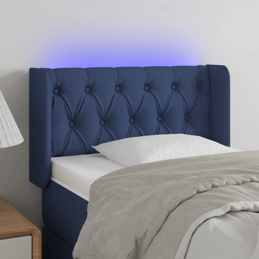 sengegavl med LED-lys 83x16x78/88 cm stof blå