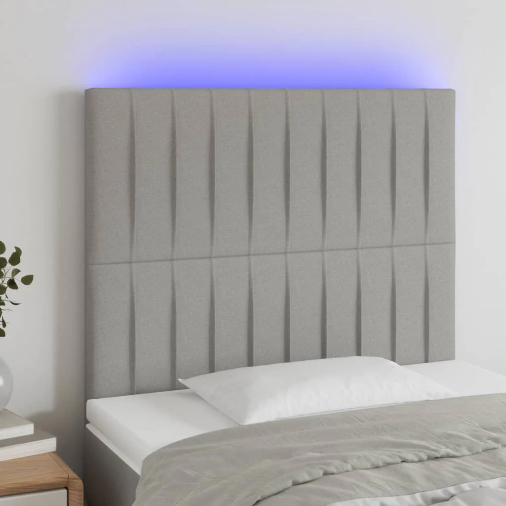 sengegavl med LED-lys 90x5x118/128 cm stof lysegrå