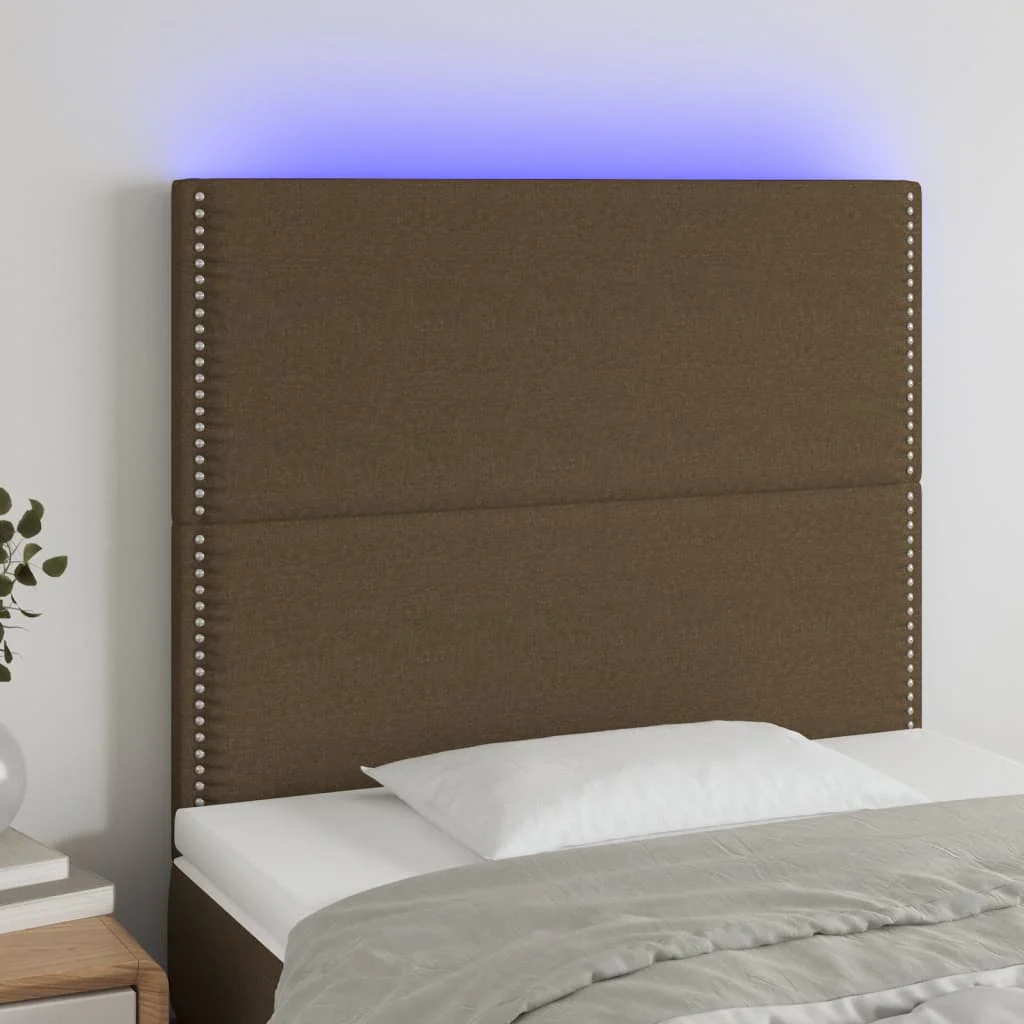 sengegavl med LED-lys 90x5x118/128 cm stof mørkebrun